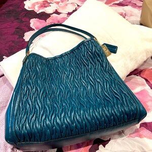 Beautiful coach bag in teal…